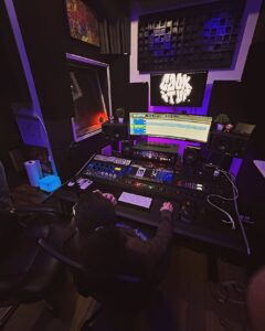 Cook it up Studios, with lots of musical production equipment set up for recording and mixing