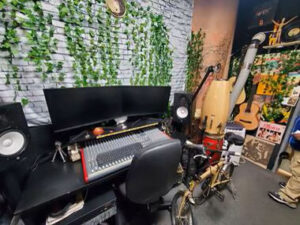 Recording equipment and instruments at a BQE music studio